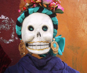 A young and smiling calavera