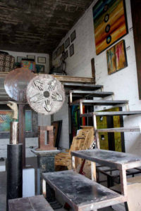 These stairs lead to an upstairs loft in Ivan Guaderrama's studio-gallery. The walls display some of the Mexican artist's newer works. © Mariah Baumgartle, 2011