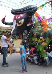 Monumental torito, or "little bull" on a street in Tultepec, State of Mexico. In recent years, images of skeletons and figures from history and Mexican culture have grown up to ten meters high. Photo © Leigh Thelmadatter, 2019