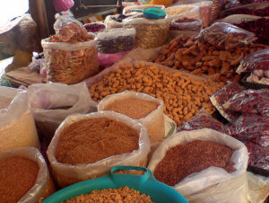This Mexican tianguis stall offers grains, pasta, peanuts, tamarind fruit and dried hibiscus blossoms used to brew agua de jamaica. © Daniel Wheeler, 2009