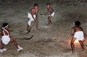 In total darkness, local youngsters play Ulama, a game featuring a flaming wooden ball and hockey-like sticks. Ulama is probably a modern form of the ancient ball game played at the 111-meter-long Guachimontón court in the Jalisco archeological site. © John Pint, 2009