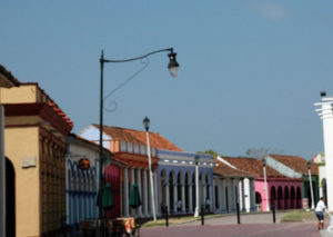 Houses in cheerful colors line a street in the Mexican river port town of Tlacotalpan, Veracruz. In 1998, the historical district of Tlacotalpan was declared a World heritage Site by UNESCO. © Roberta Sotonoff, 2009