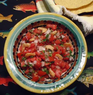 Pico de gallo or fresh salsa mexicana — chopped tomato, onion and serrano chile — served as an appetizer with dried shrimp © Karen Hursh Graber, 2013