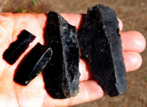 Unfinished prismatic blades of obsidian, typical of what can be found at thousands of ancient workshops in the hills west of Guadalajara, Mexico. © John Pint, 2009