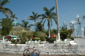 A bandstand centers the main plaza in Mexico's river port town of Tlacotalpan, Veracruz. White wrought iron benches invite people to linger and are perfect for people watching. © Roberta Sotonoff, 2009