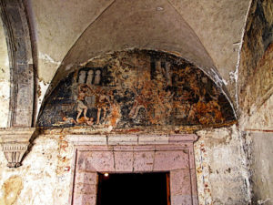 Religious art adorns many of the arched niches above doorways in the 16th century Ex-Convento de San Pablo Apostol in Yuriria, Michoacan. Perhaps the fire of 1814 is partially responsible for their state of decay. This original photograph forms part of the Olden Mexico collection. © Darian Day and Michael Fitzpatrick, 2010