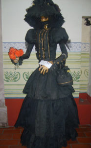 A familiar sight in Mexico's Day of the Dead festivities, Catrina was born of a lithograph by Jose Guadalupe Posada. She wears black as she welcomes visitors at the entrance to the Museo Nacional de la Muerte (National Museum of Death) in Aguascalientes. © Diodora Bucur, 2009