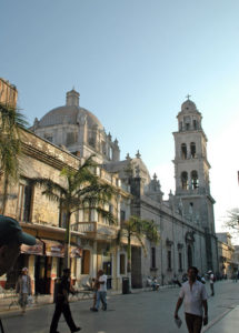 A steet in downtown Veracruz, Mexico is lined with beautiful colonial era buildings. One block ahead, the cathedral looks over the city's Plaza de Armas, or zocalo. © Roberta Sotonoff, 2009