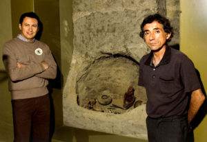 Archeologist Rodrigo Esparza and Tala Museum Curator Guadalupe Romero with a representation of a shaft tomb. The deepest such tomb (22 meters deep) was found just outside Tala, Mexico. © John Pint, 2011
