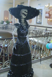 A life-size Catrina greets customers at Sanborn's in the historic center of Aguascalientes. A familiar sight in Mexico's Day of the Dead festivities, Catrina was born of a lithograph by Jose Guadalupe Posada. © Diodora Bucur, 2009