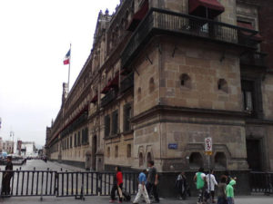 This busy Mexico City street corner is located at one end of the imposing Palacio Nacional on the Zocalo © Lilia, David and Raphael Wall, 2012