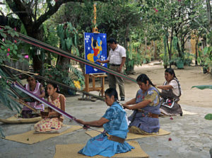 The Navarro Gomez family of Oaxaca weaves cotton belts on backstrap looms. © Arden Aibel Rothstein and Anya Leah Rothstein, 2007