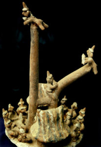 A sturdy pole was set at the top of each circular pyramid at Guachimontones near Teuchitlan, Jalisco. This 2,000-year-old clay model shows a bird-man "flying" as the pole sways back and forth. © John Pint, 2009