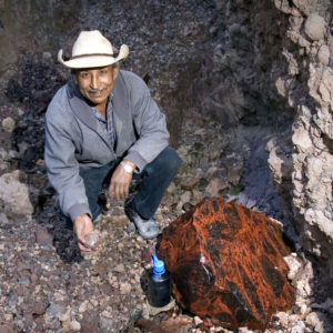 Don Eleno Espinoza with an unusually large piece of Indian-Blood obsidian still awaiting transportation to his workshop in Navajas. The Mexican state of Jalisco has some of the richest obsidian deposits in the world. © John Pint, 2009