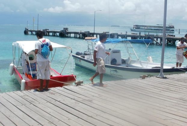 Days end after a fishing trip on Isla Mujeres. Outcome, success. © Louie Frias, 2013