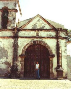 Emilia Rangel Brun, in front of the Franciscan capilla at Nogueras.