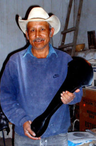 Eleno Espinoza with an obsidian axe produced in his workshop after a design by Mexican sculptor Lolita Ortiz. The Mexican state of Jalisco has some of the richest obsidian deposits in the world. © John Pint, 2009