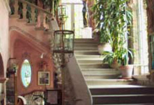 The lobby and staircase leading to the second floor rooms.