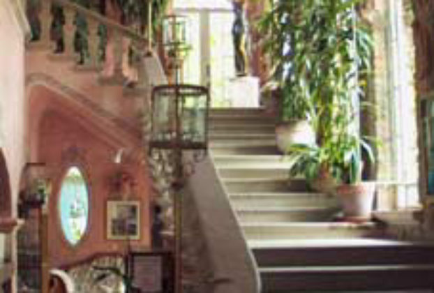 The lobby and staircase leading to the second floor rooms.