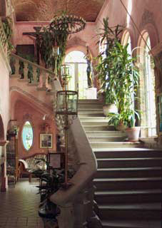 The lobby and staircase leading to the second floor rooms.