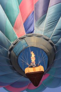 Just before 7 a.m., the first pilot lights up his burner at the annual International Balloon Festival in Leon, Mexico © Tara Lowry, 2014