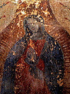 This ancient painting of the Virgin of Guadalupe appears at the Convent of San Agustin in Yuriria. Now designated a national monument, the construction of this spectacular and massive structure began November of 1550 -- just 19 years after Juan Diego's vision of the Virgin -- and was completed nine years later. © Darian Day and Michael Fitzpatrick, 2009