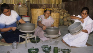 The Martin Mario Enriquez family works in clay to create traditional Oaxaca ceramics. © Arden Aibel Rothstein and Anya Leah Rothstein, 2007
