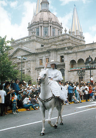 Girl in escaramuza dress, the female counterpart to a charro