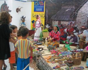 The exhibit's visual display is divided into scenes that depict Huichol life, dress, foods and rituals. © Kinich Ramirez, 2006