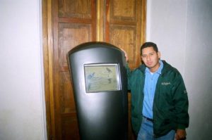 Romeo Tinajero of the Museum of the Birds, stands next to one of the two touch screens there. A third touch screen is scheduled to be installed in February or March of 2006.