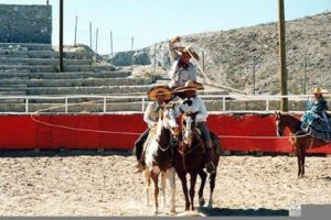 A Charro performs a "Florear de Reata", complex lariate patterns" Photography by Gilbert W. Kelner. © 2000