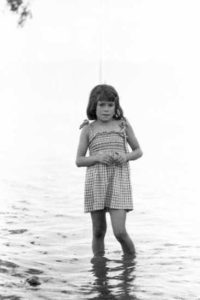 And here is Sara Johnson-Pérez again, in September 1972. She may look like she is paddling, and finding the water rather chilly, but actually she is standing on the end of Ajijic pier! In the early 1970s, the level of water in the lake reached its highest for more than a century. At the time the photo was taken, Lake Chapala was well above level 98, more than two meters higher than in 1965. Photo, now in collection of Tamara Johnson, taken by Beverly Johnson; all rights reserved.