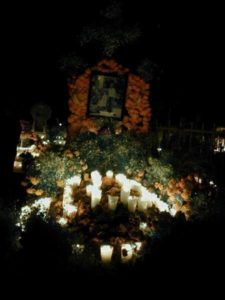 Candles are lit at night before the ofrendas. Images provided by SECTUR, Michoacán