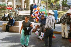 A man sells toys and balloons in Plaza Manuel Acuña.
