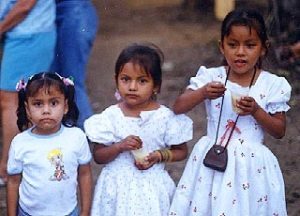Three sisters pose at the Recibímiento. Photography by Wendy Devlin. © 2000