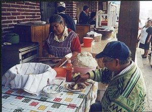 Enjoy soup and handmade tortillas from a street stall. Photography by Bill Arbon. © 2001