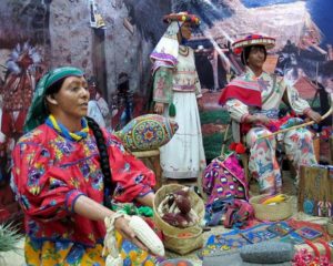 Huichol clothing, art and customs on exhibit in The Wixarika World: A Visit to the Huichol Lands. © Kinich Ramirez, 2006