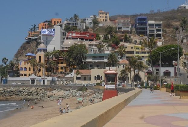 Apartments and mansions cling to the cliff along the famous Mazatlan malecon. © Gerry Soroka, 2009