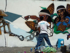 A graffiti muralist in Mexico City works very fast, which is not surprising. © Anthony Wright, 2009