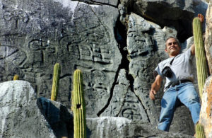 Hundreds of petroglyphs decorate a flat wall of marble at El Altilte, near Barra de Navidad on Mexico's Pacific coast. The site is unprotected and has been vandalized. © John Pint, 2010