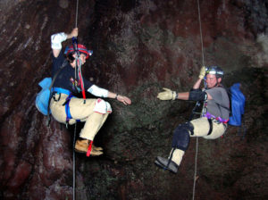 Friendly cavers ascending ropes in Cueva Iztaxiatla Lava Tube, Morelos. Most caves in Mexico are found in limestone and often display magnificent stalactites, stalagmites and other formations like draperies, shields and gravity-defying helictites. © John Pint, 2010