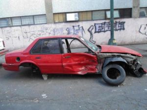 Car in Mexico Cty with the sign "Sold as Parts' © Peter W. Davies, 2013