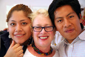 Elsa Sanchez Diaz, Norma Hawthorne and Eric Chavez Santiago put their heads together for a close-up photo. Elsa and Eric are friends who met at Universidad Anahuac in Oaxaca city, where they graduated with degrees in business and tourism.© Norma Hawthorne 2008