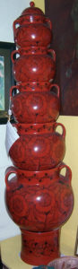 Sleek clay ollas, or jars, are crafted by hand. Towers of stackable jars such as this one were originally used to carry water, but now serve as decorative pieces. This piece was exhibited in Chapala's annual Feria Maestros del Arte. © Marianne Carlson, 2008