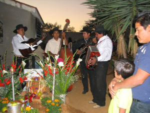 This musical group performed in a small cemetery in a village near Oaxaca City. Although Day of the Dead is a spiritual and reverent occasion, it is also a happy time because souls of loved ones join in the festivities. The combination of happiness and sadness makes Day of the Dead a special and confusing attraction to foreign visitors.