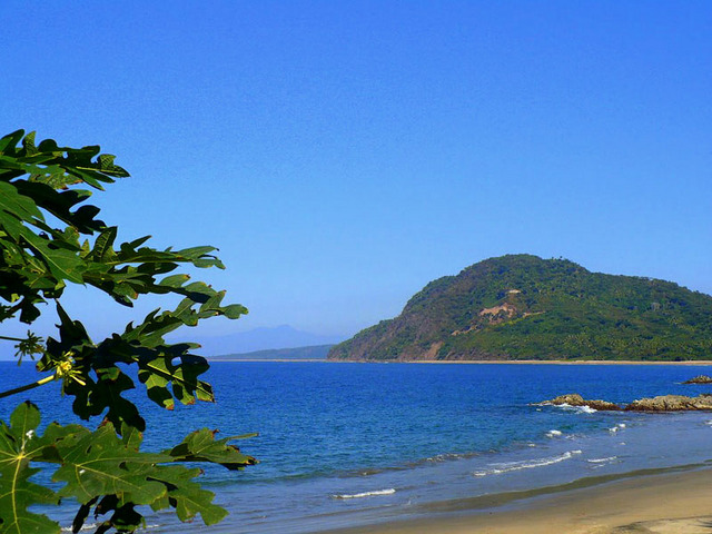 Set in a palm-fringed bay on Mexico's Pacific coast, the beach of Lo de Marcos is simply gorgeous, resembling Hawaii. © Christina Stobbs, 2009