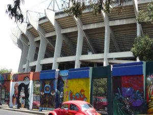 Graffiti murals line the outside perimeter of Mexico City's Estadio Azteca (Aztec Stadium). © Anthony Wright, 2009