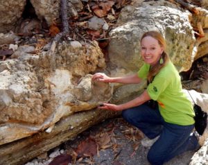 Barbara Dye: U.S. Peace Corps volunteer Barbara Dye examines the point where giant blocks of pumice settled at the bottom of the Primavera-Caldera lake pushing their way into the lake sediment. © John Pint, 2014