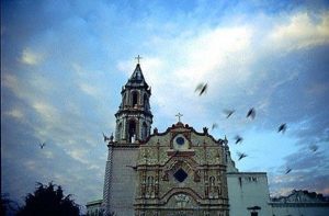 Sunrise illuminates the facade of the Mission in Jalpan.