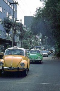 Ubiquitous VW beetle taxis roam the Avenida, slipping through the maze of streets, boulevards, and alleys that is Mexico City as only a Bug can. Photography by Bill Begalke © 2001